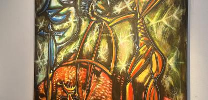 Large abstract painting titled Perspective featuring stylized, elongated figures in glowing gold, orange, and blue tones against a dark, textured background, displayed in a modern gallery corner beside two smaller framed artworks.
